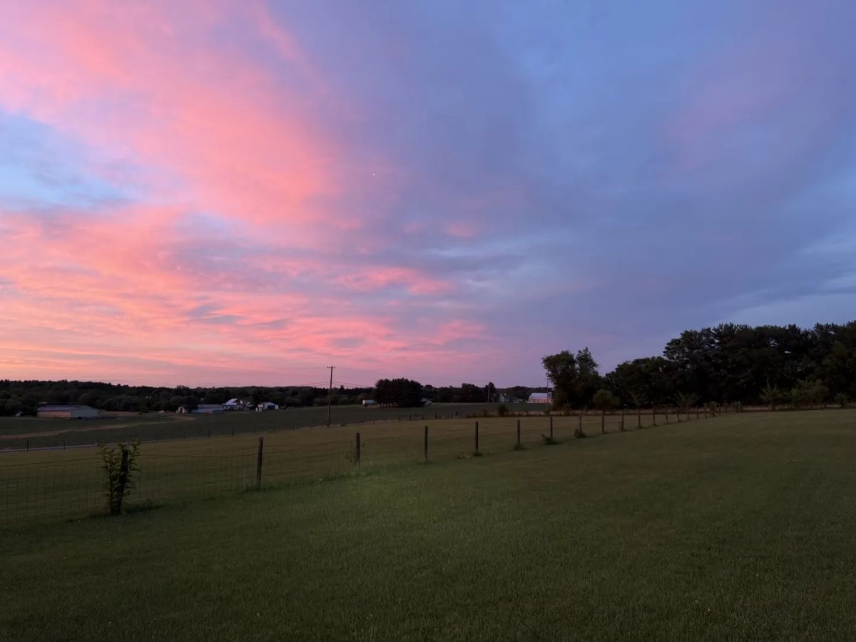Pink sunset sky over the farm in Frederick, Maryland